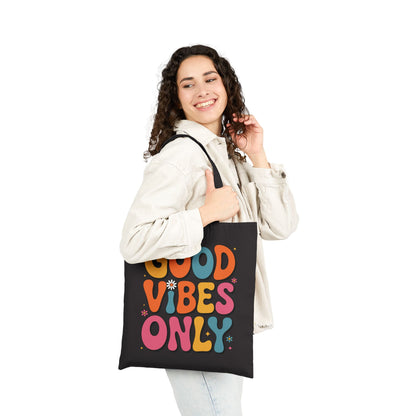Positive quote Good Vibes Only in colorful text displayed on a TEEZOCA tote bag