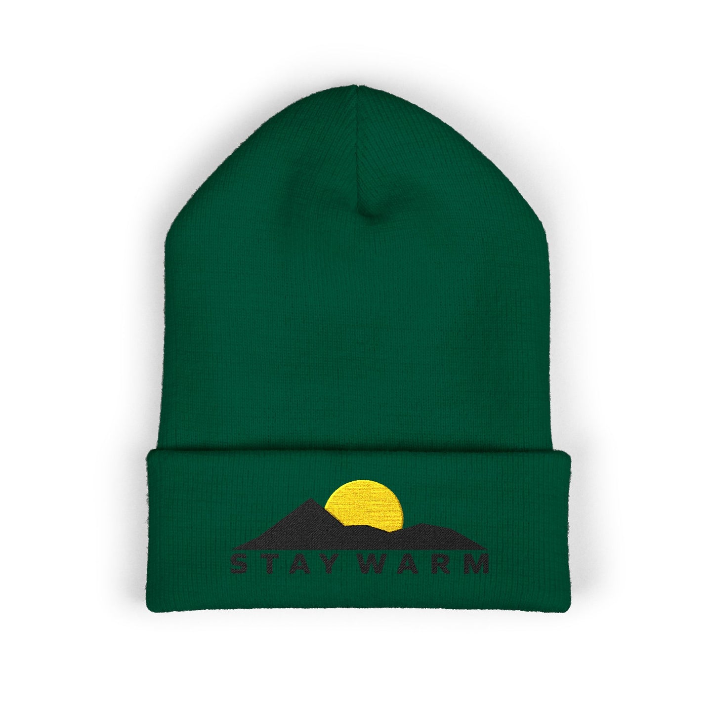 Green beanie with embroidered design and text on a white background