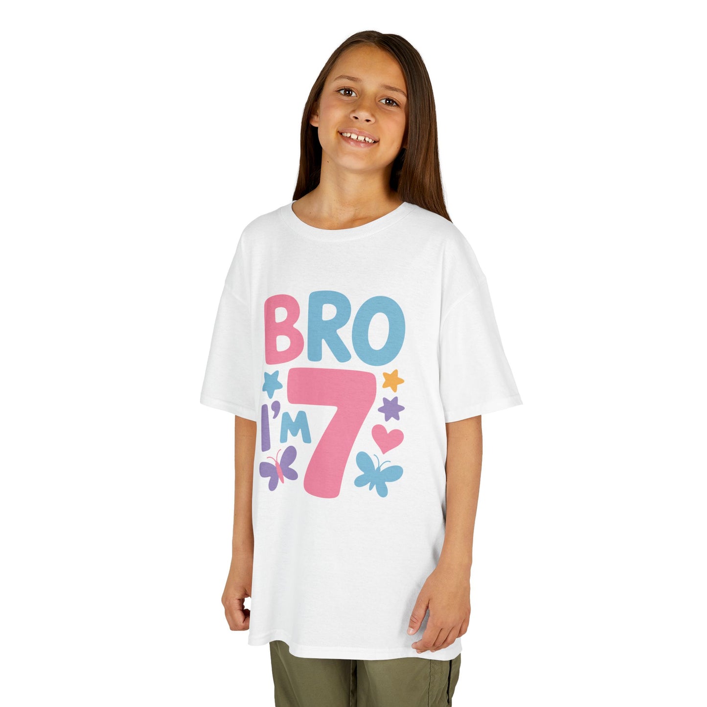 "Girl wearing Teezoca Bro I'm 7 t-shirt, cute colorful sibling birthday design with flowers and butterflies, white tee, front."

