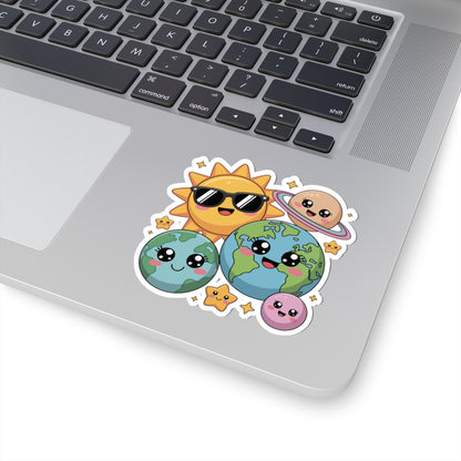 Laptop with a sticker of a sun, planets, and stars on the palm rest area. TEEZOCA
