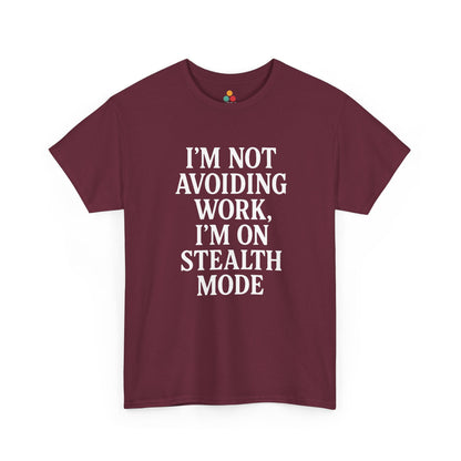 "Maroon unisex t‑shirt with white 'I'm Not Avoiding Work, I'm On Stealth Mode' text, flat display."

