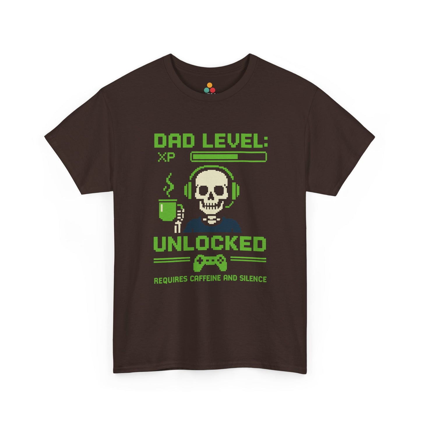 “Brown gamer dad tee featuring pixel skull with headset, steaming mug, and ‘Dad Level Unlocked’ text, flat front.”


