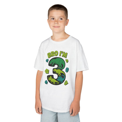"Child wearing white 'Bro I'm 3' dinosaur birthday t‑shirt with big number 3 and dinos, front view."

