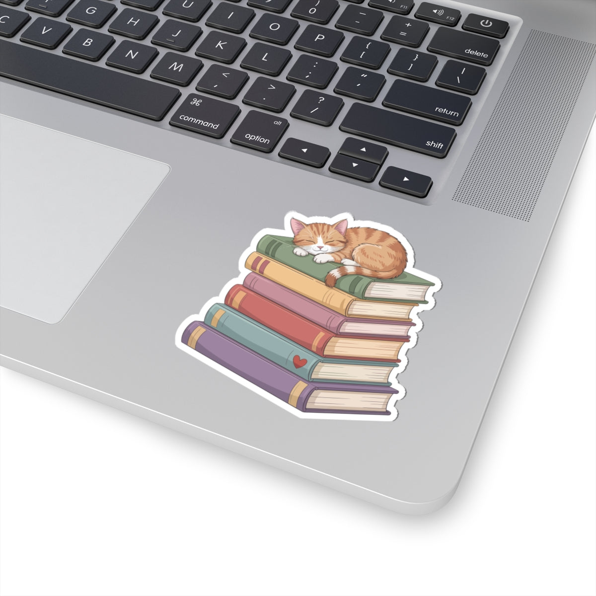 TEEZOCA book lover sticker cat sleeping on stacked books design
