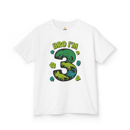 "White kids t‑shirt with large dinosaur-filled number 3 and the text 'BRO I'M 3' surrounded by green and blue cubes, flat front view."

