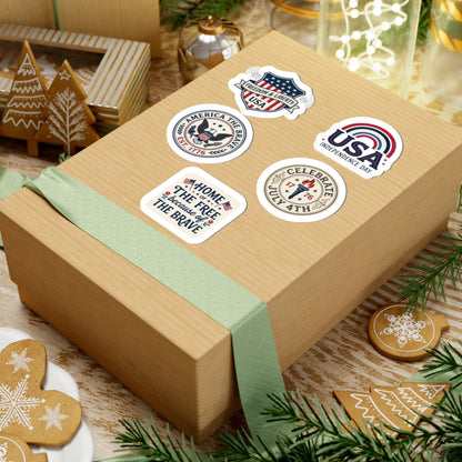 A large brown mailing box featuring TEEZOCA 1776 liberty stickers next to a green decorative ribbon.
