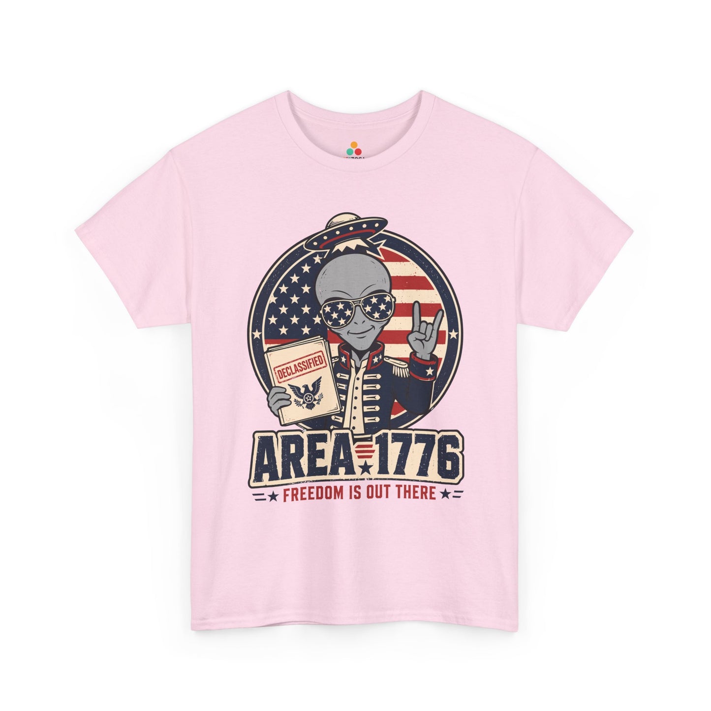 Alien Independence Day T-shirt by TEEZOCA with Freedom Shirt styling, UFO badge art, and red, white, and blue details.
