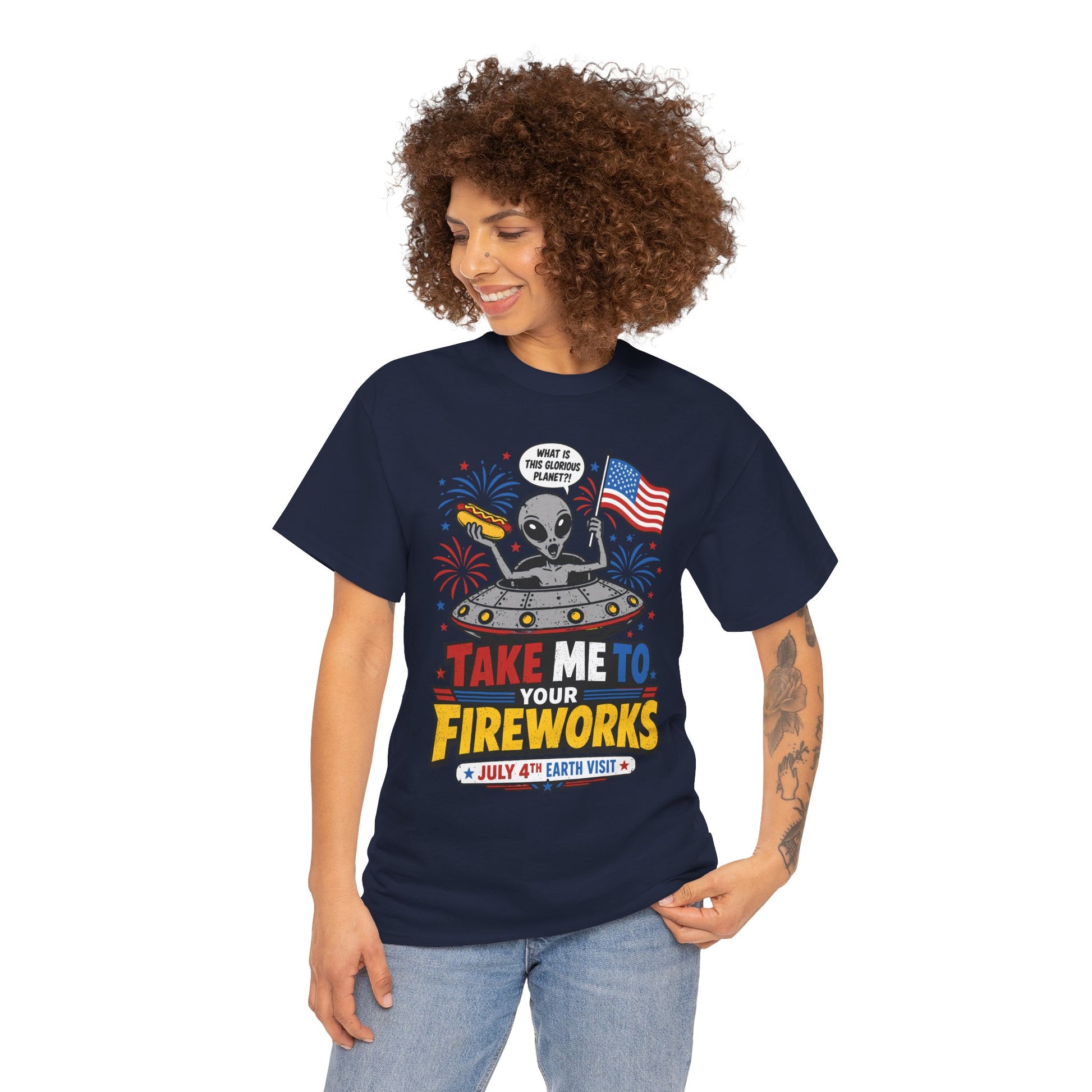 Alien Shirt, Funny UFO 4th of July Fireworks Graphic T-shirt | Alien shirt by TEEZOCA showing a funny gray alien in a flying saucer holding a flag and hot dog for 4th of July fireworks.
