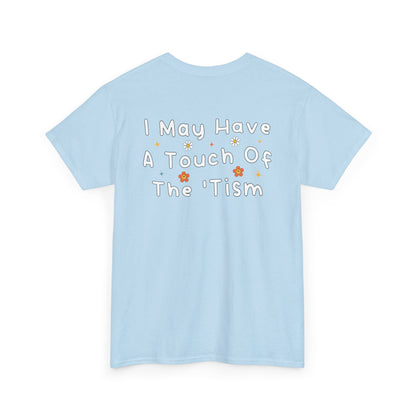 Back Print of a Light Blue T-shirt featuring the phrase “I May Have a Touch of the 'Tism” in bold hand-drawn lettering with colorful floral and star accents, funny autism humor shirt, neurodivergent statement tee, and playful back print graphic design.
