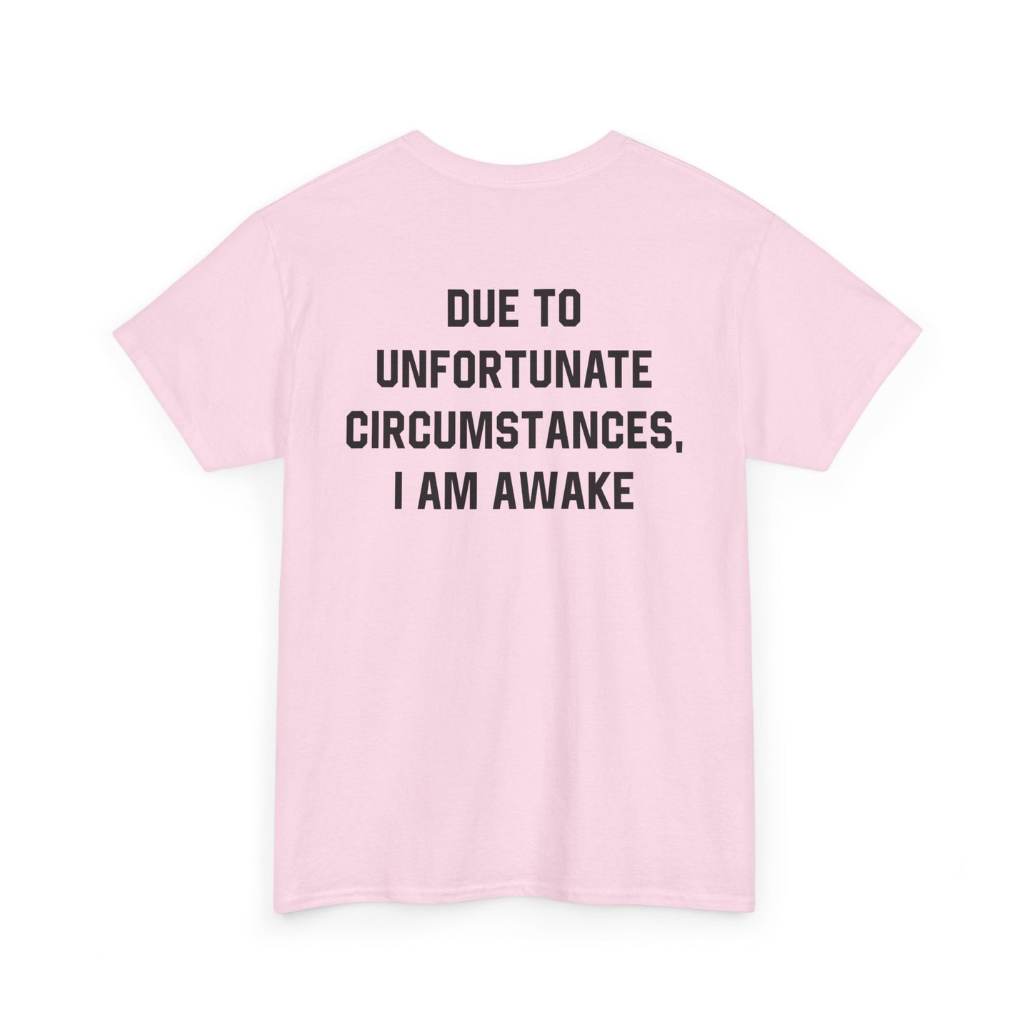 Back Print of a Light Pink T-shirt featuring bold black text reading "Due To Unfortunate Circumstances, I Am Awake," funny back print sarcastic quote shirt, not a morning person tee, dry humor graphic shirt, and blunt statement design.
