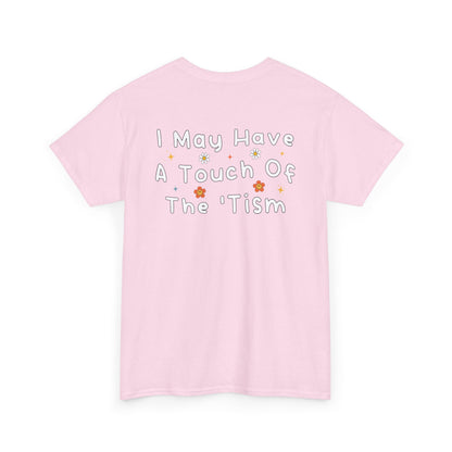 Back Print of a Light Pink T-shirt featuring the phrase “I May Have a Touch of the 'Tism” in bold hand-drawn lettering with colorful floral and star accents, funny autism humor shirt, neurodivergent statement tee, and playful back print graphic design.
