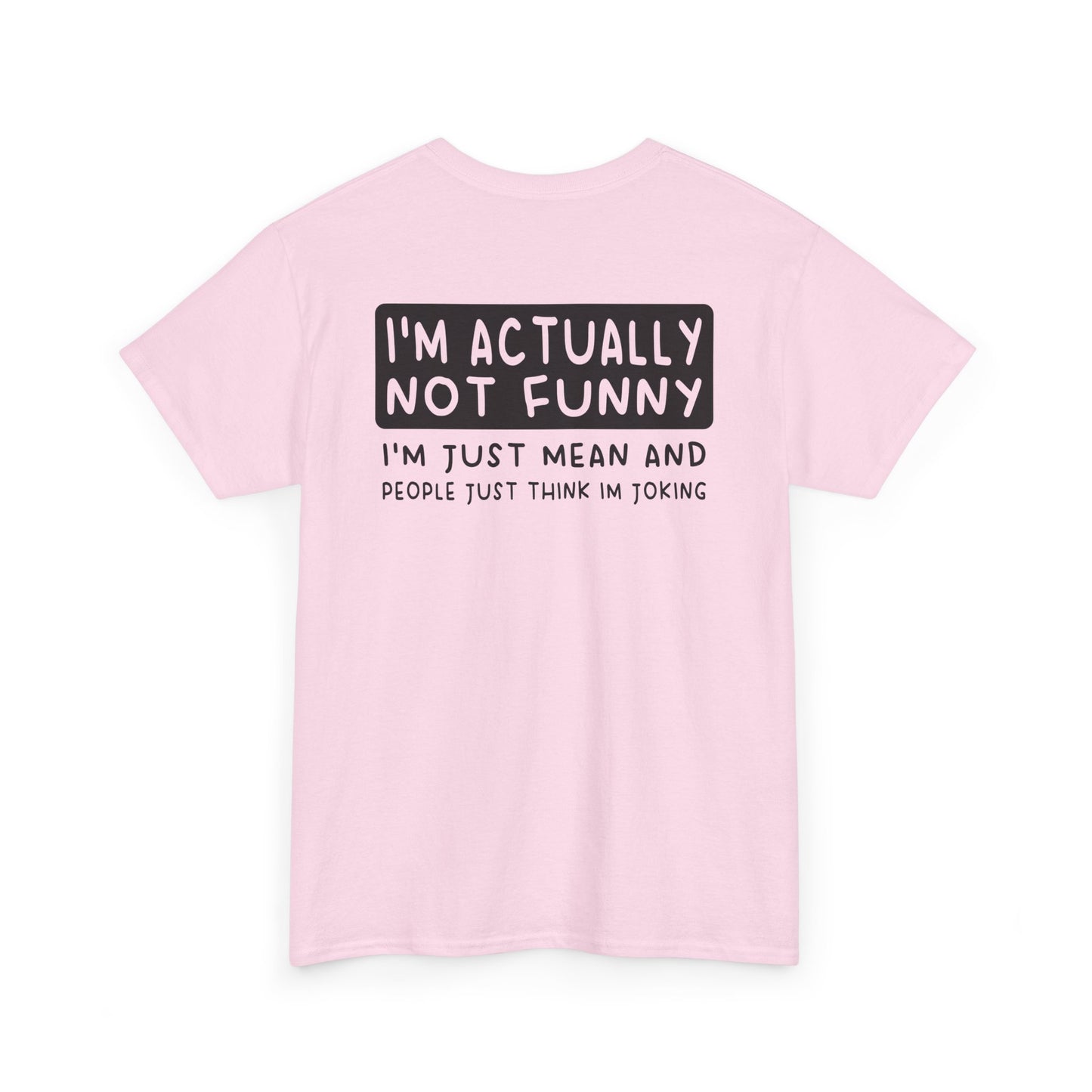 Back Print of a Light Pink T-shirt featuring the phrase “I’m Actually Not Funny, I’m Just Mean and People Just Think I’m Joking” in bold black text, funny sarcastic back print shirt, dry humor quote tee, blunt statement graphic tee, and minimalist witty design.

