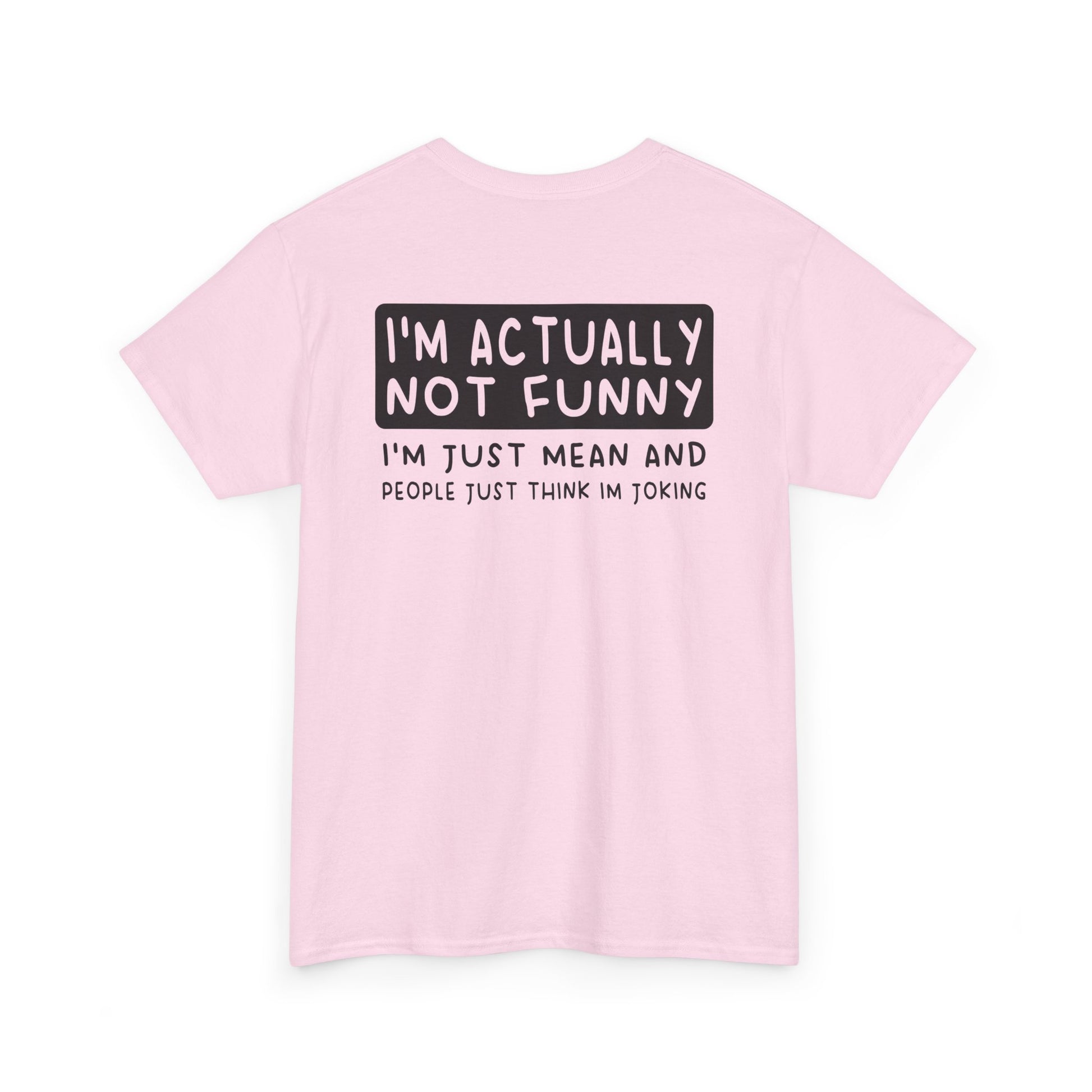 Back Print of a Light Pink T-shirt featuring the phrase “I’m Actually Not Funny, I’m Just Mean and People Just Think I’m Joking” in bold black text, funny sarcastic back print shirt, dry humor quote tee, blunt statement graphic tee, and minimalist witty design.

