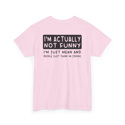 Back Print of a Light Pink T-shirt featuring the phrase “I’m Actually Not Funny, I’m Just Mean and People Just Think I’m Joking” in bold black text, funny sarcastic back print shirt, dry humor quote tee, blunt statement graphic tee, and minimalist witty design.

