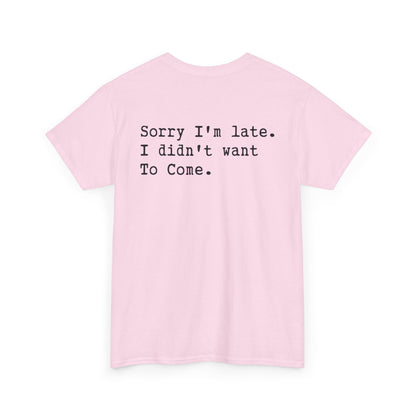 Back Print of a Light Pink T-shirt featuring the phrase “Sorry I’m Late. I Didn’t Want To Come.” in clean black typewriter-style text, funny back print quote shirt, sarcastic statement tee, introvert humor graphic, and minimalist text design.


