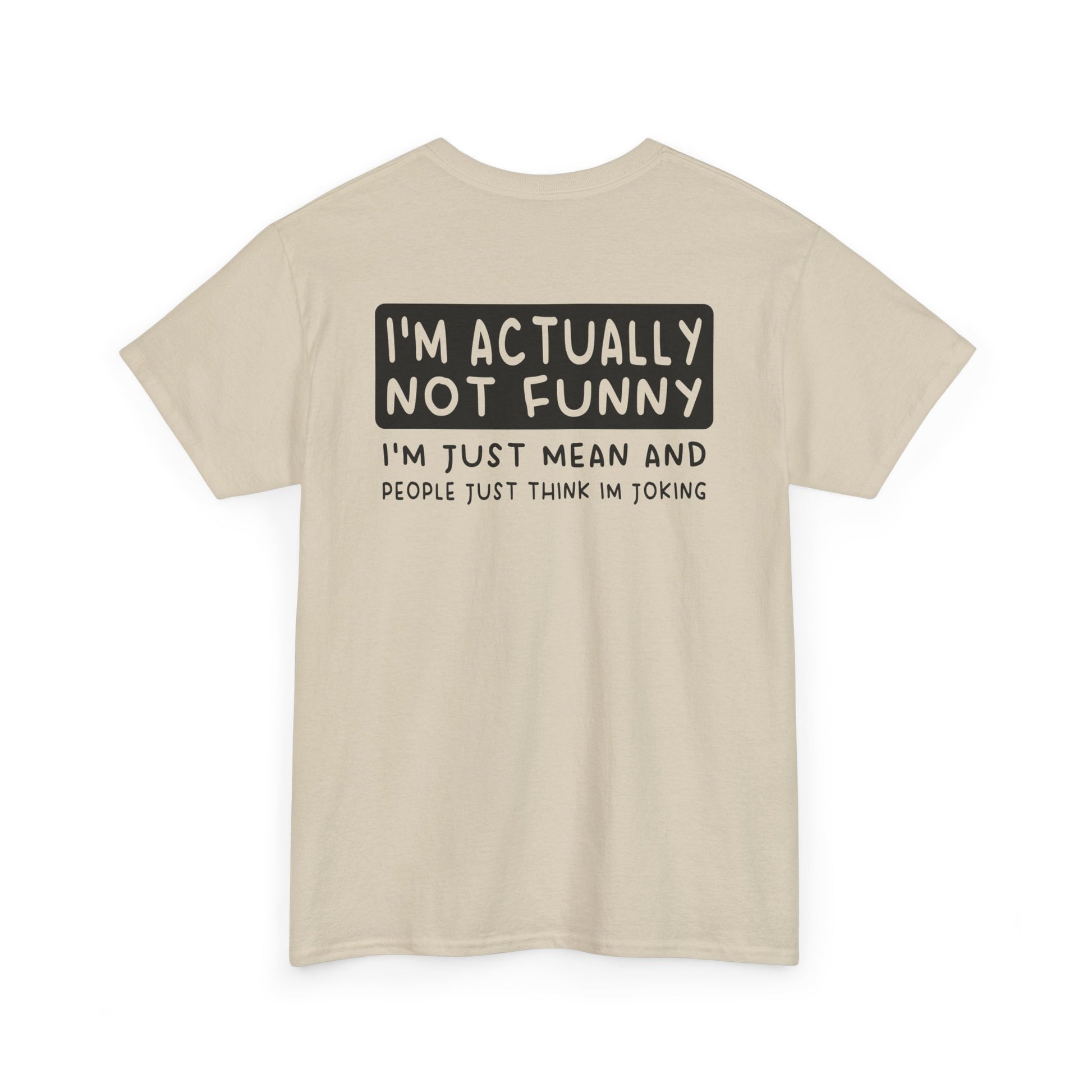 Back Print of a Sand T-shirt featuring the phrase “I’m Actually Not Funny, I’m Just Mean and People Just Think I’m Joking” in bold black text, funny sarcastic back print shirt, dry humor quote tee, blunt statement graphic tee, and minimalist witty design.

