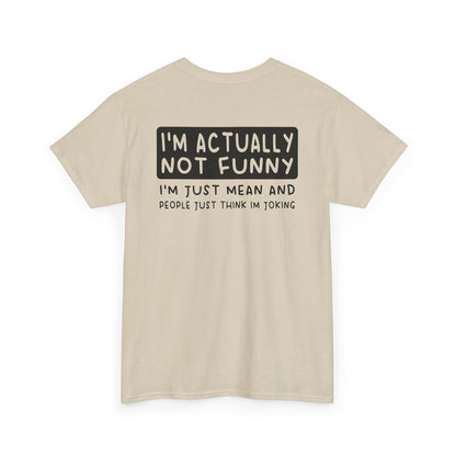 Back Print of a Sand T-shirt featuring the phrase “I’m Actually Not Funny, I’m Just Mean and People Just Think I’m Joking” in bold black text, funny sarcastic back print shirt, dry humor quote tee, blunt statement graphic tee, and minimalist witty design.

