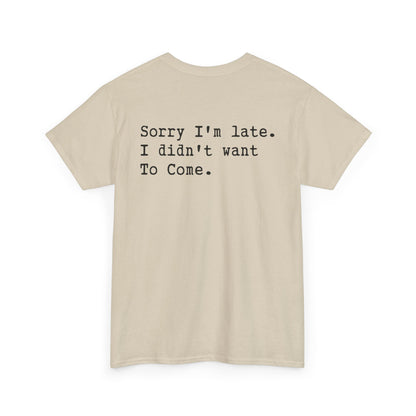 Back Print of a Sand T-shirt featuring the phrase “Sorry I’m Late. I Didn’t Want To Come.” in clean black typewriter-style text, funny back print quote shirt, sarcastic statement tee, introvert humor graphic, and minimalist text design.

