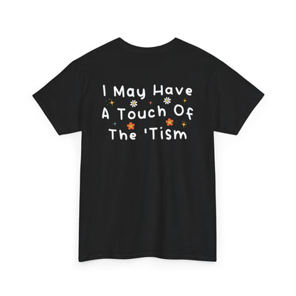 Back Print of a black T-shirt featuring the phrase “I May Have a Touch of the 'Tism” in bold hand-drawn lettering with colorful floral and star accents, funny autism humor shirt, neurodivergent statement tee, and playful back print graphic design.