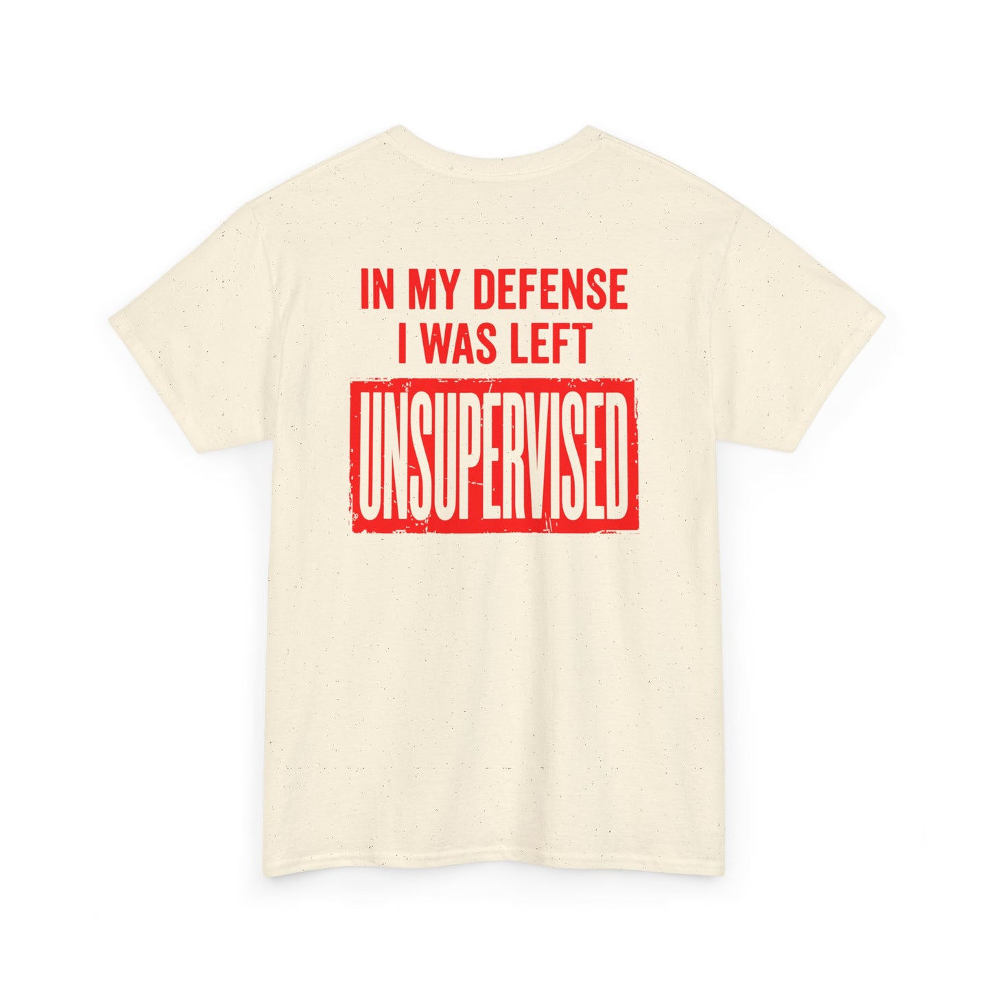 Back Print of a natural T-shirt featuring the bold red and cream quote “In My Defense I Was Left Unsupervised,” a funny back print statement tee with retro typography, sarcastic quote shirt, witty adult humor graphic, dry humor novelty apparel, bold statement t-shirt, and playful sarcasm design for fans of funny quote shirts.
