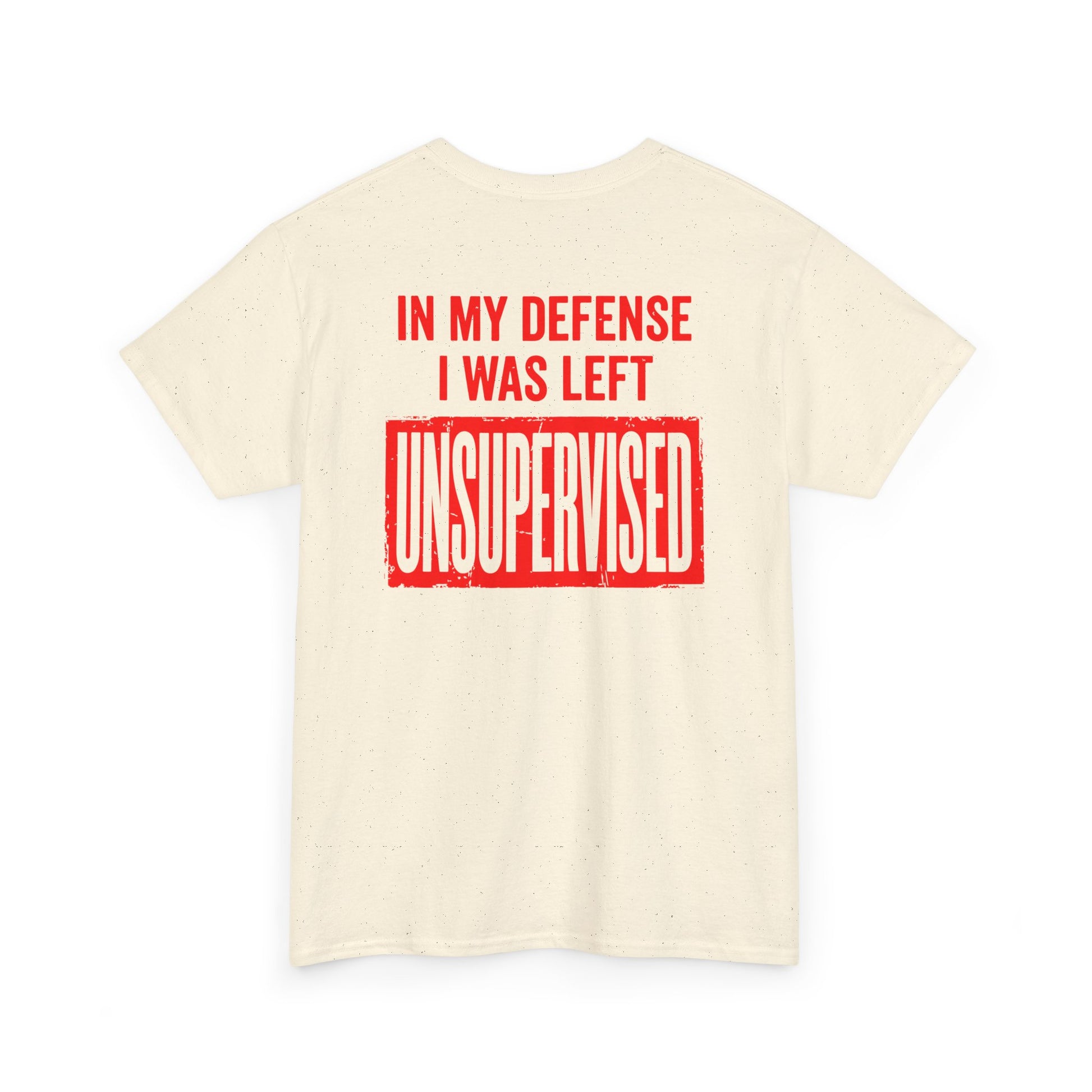 Back Print of a natural T-shirt featuring the bold red and cream quote “In My Defense I Was Left Unsupervised,” a funny back print statement tee with retro typography, sarcastic quote shirt, witty adult humor graphic, dry humor novelty apparel, bold statement t-shirt, and playful sarcasm design for fans of funny quote shirts.
