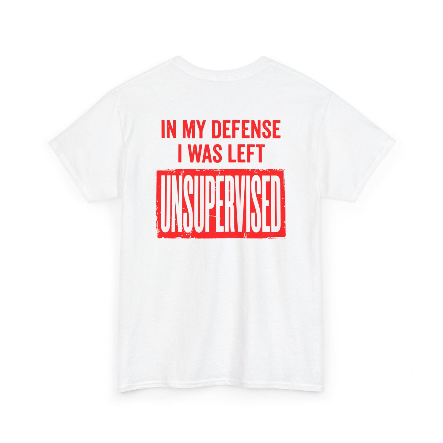 Back Print of a white T-shirt featuring the bold red and cream quote “In My Defense I Was Left Unsupervised,” a funny back print statement tee with retro typography, sarcastic quote shirt, witty adult humor graphic, dry humor novelty apparel, bold statement t-shirt, and playful sarcasm design for fans of funny quote shirts.

