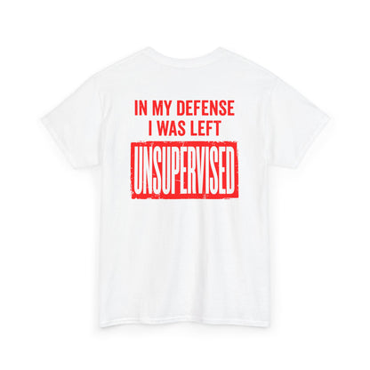 Back Print of a white T-shirt featuring the bold red and cream quote “In My Defense I Was Left Unsupervised,” a funny back print statement tee with retro typography, sarcastic quote shirt, witty adult humor graphic, dry humor novelty apparel, bold statement t-shirt, and playful sarcasm design for fans of funny quote shirts.

