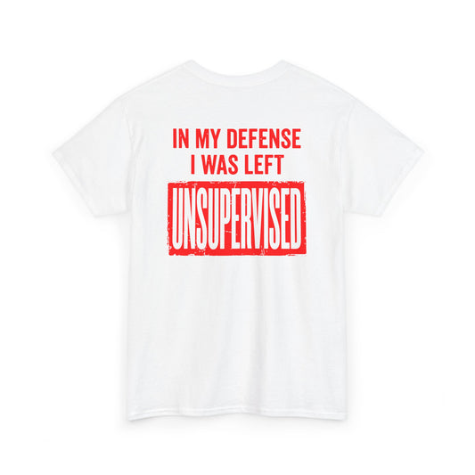 Back Print of a white T-shirt featuring the bold red and cream quote “In My Defense I Was Left Unsupervised,” a funny back print statement tee with retro typography, sarcastic quote shirt, witty adult humor graphic, dry humor novelty apparel, bold statement t-shirt, and playful sarcasm design for fans of funny quote shirts.

