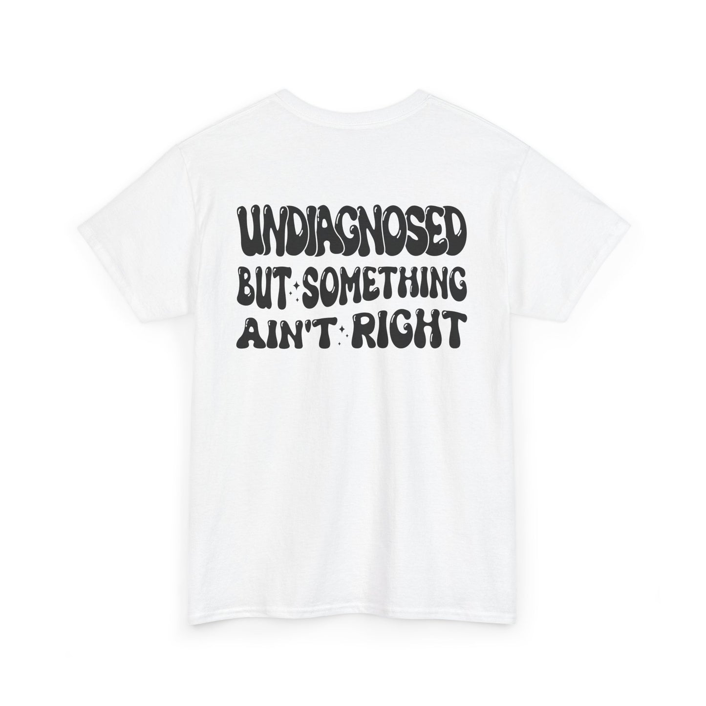 Back Print of a white T-shirt featuring the viral meme phrase "Undiagnosed But Something Ain't Right" in bold wavy retro typography, a trending funny mental health meme shirt, unhinged humor tee, therapy meme graphic, and relatable back print statement design.

