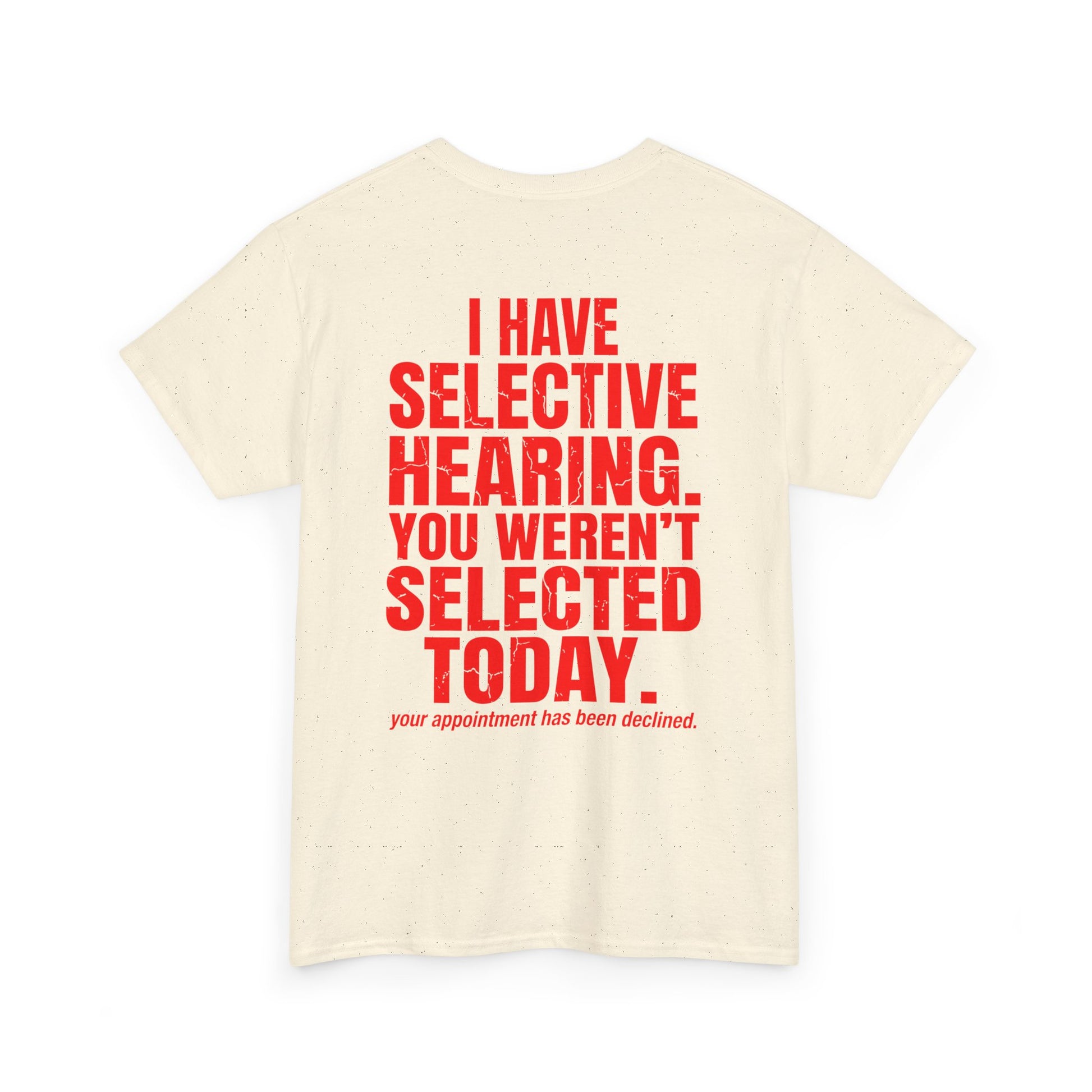 Back print of a biege T-shirt with bold red text reading “I Have Selective Hearing You Weren’t Selected Today” and smaller sarcastic text below.


