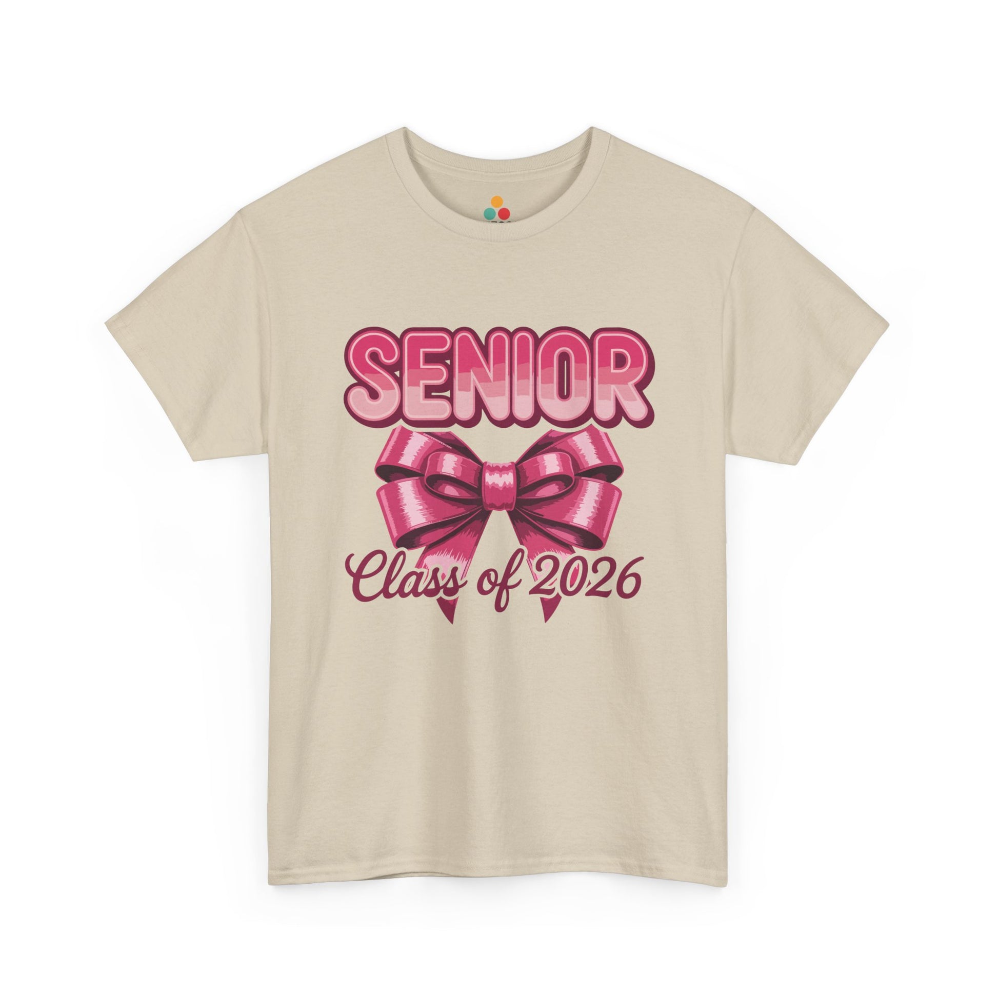 Beige TEEZOCA Senior Class of 2026 pink bow graduation t‑shirt displayed flat.