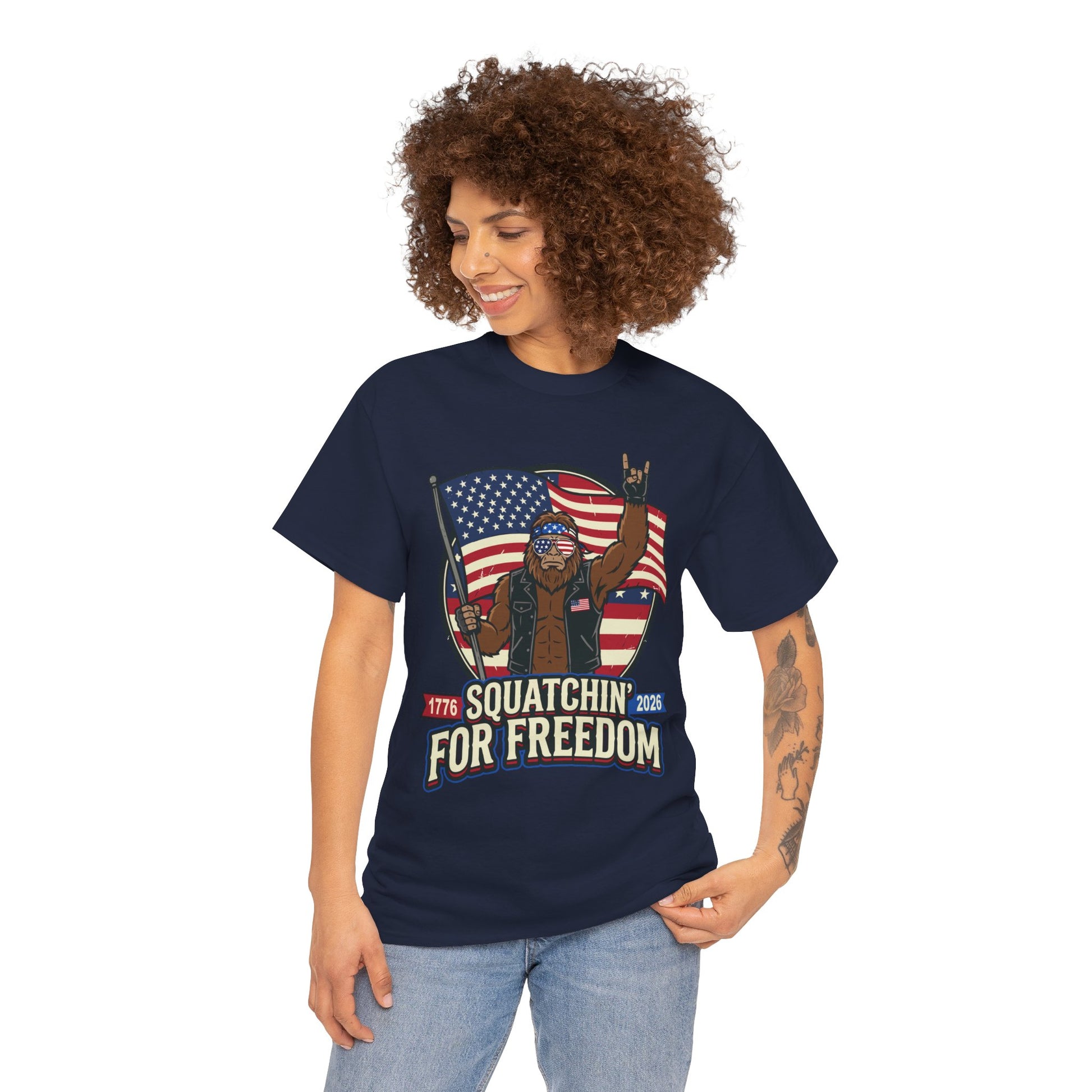 Biker Shirt with Bigfoot, Squatchin' For Freedom art, 1776 2026 dates, and American flag style for 4th of July, BBQs, fireworks, riders, and TEEZOCA gifts.
