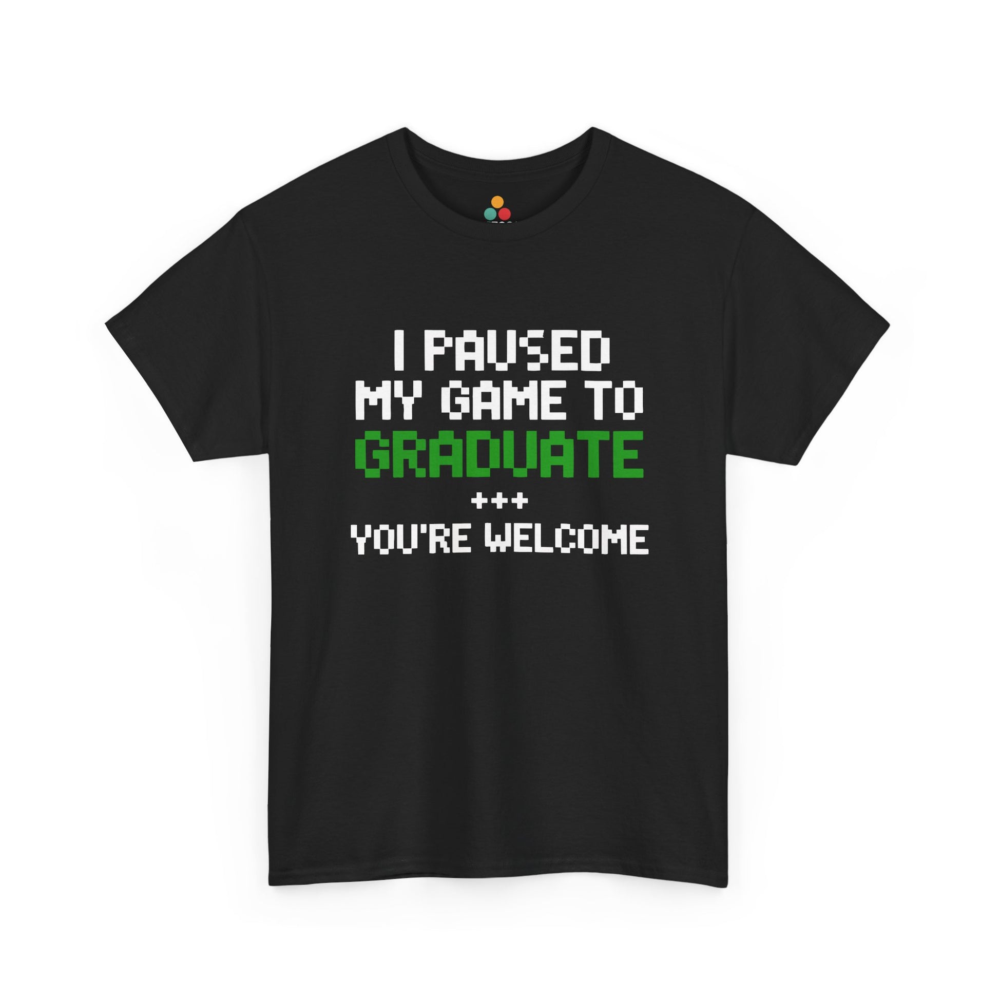 Black TEEZOCA t‑shirt with pixel text “I PAUSED MY GAME TO GRADUATE YOU’RE WELCOME” in white and green shown flat.