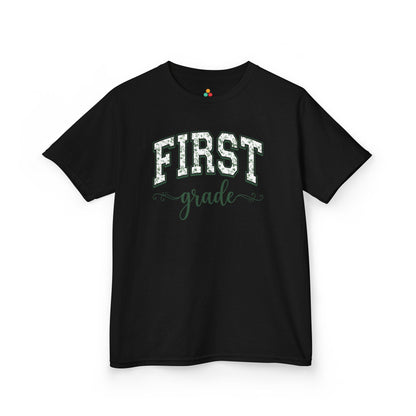 Black t-shirt TEEZOCA first grade shirt for kids featuring sage floral varsity lettering, made for a child's first-day-of-school photo.
