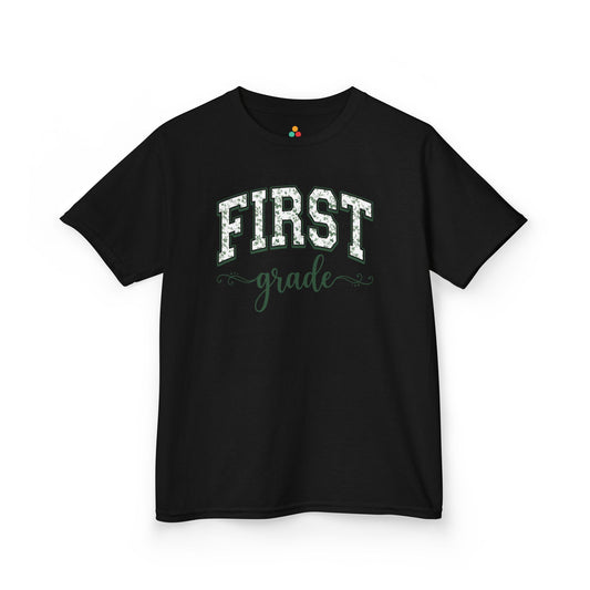 Black t-shirt TEEZOCA first grade shirt for kids featuring sage floral varsity lettering, made for a child's first-day-of-school photo.
