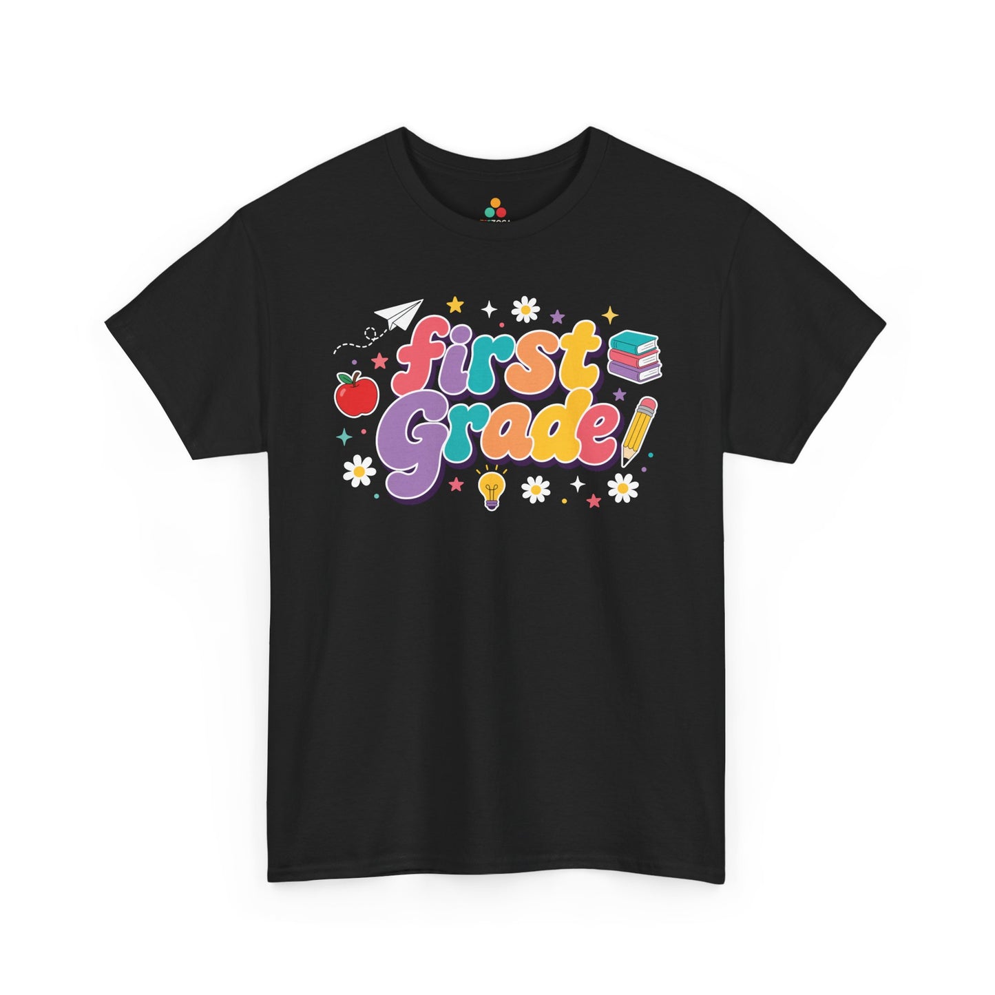 Black t-shirt with 'first grade!' text and colorful graphics on a white background. Colorful TEEZOCA first grade teacher t-shirt with coral, lavender, teal, peach, and yellow lettering, created for classroom teams.