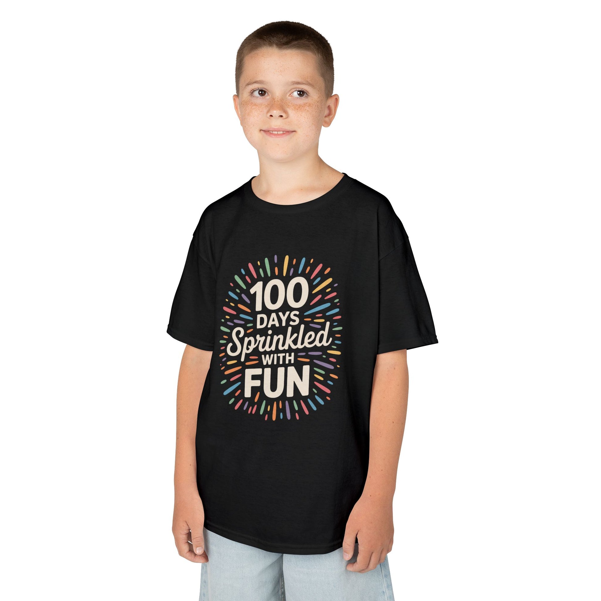 Boy wearing a black TEEZOCA “100 Days Sprinkled With Fun” 100th day of school shirt.