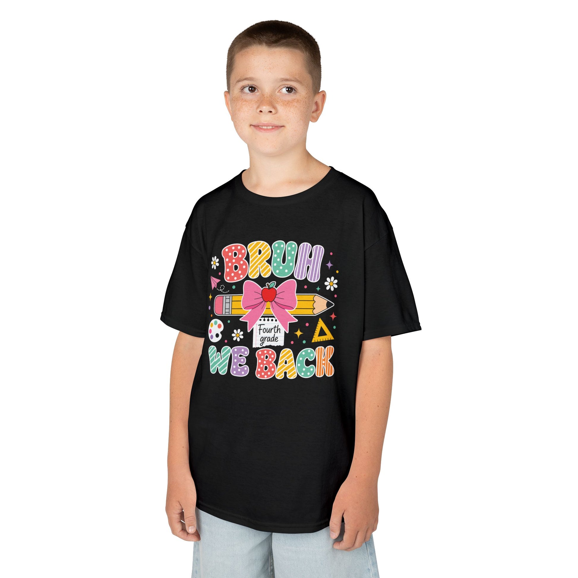 Boy wearing a black TEEZOCA Bruh We Back Fourth Grade kids t-shirt, a funny back to school shirt.
