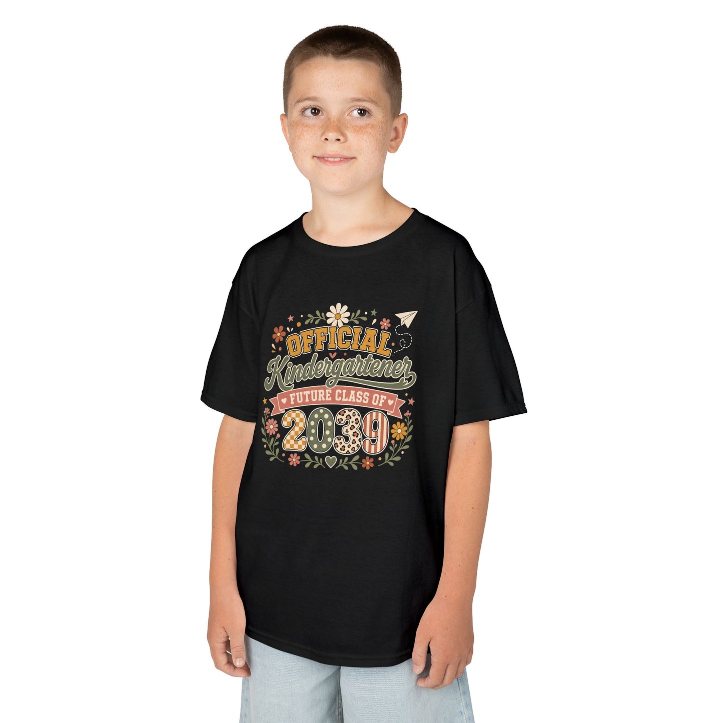 Boy wearing a black TEEZOCA Future Class of 2039 kids t-shirt, a cute back to school keepsake shirt for a new kindergartener.

