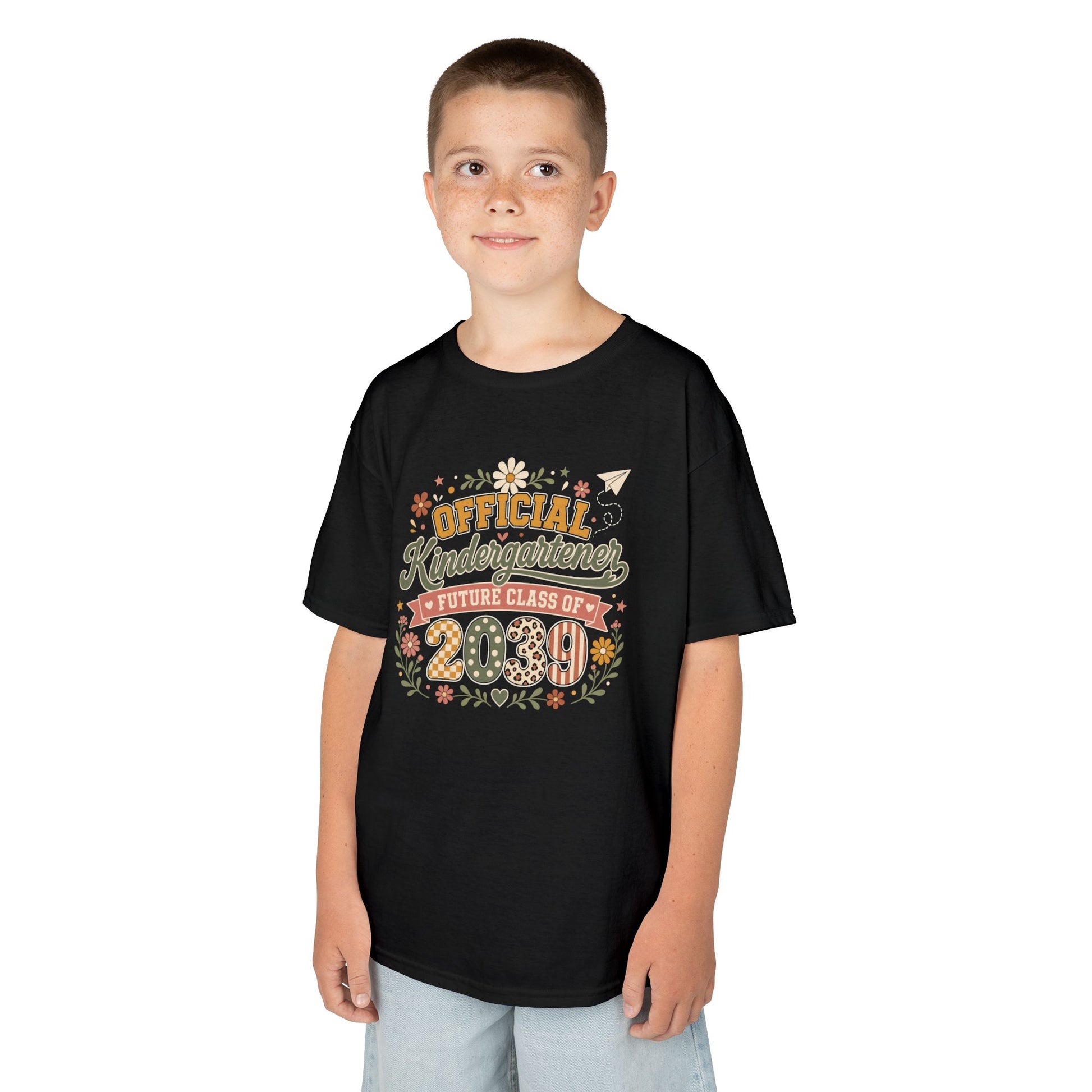 Boy wearing a black TEEZOCA Future Class of 2039 kids t-shirt, a cute back to school keepsake shirt for a new kindergartener.
