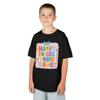 Boy wearing a black TEEZOCA Happy to See Your Face kids t-shirt, a cute back to school shirt for the first day.
