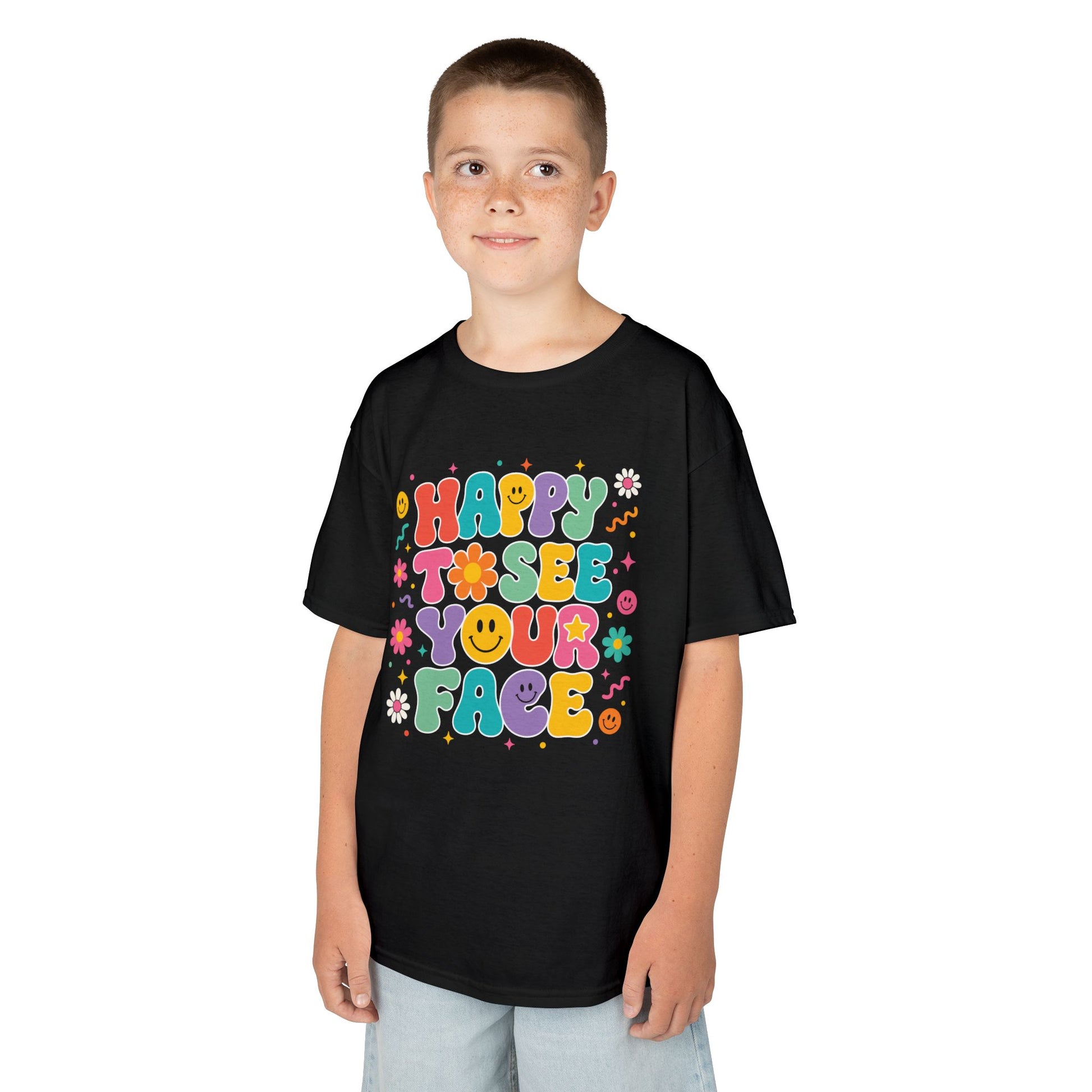 Boy wearing a black TEEZOCA Happy to See Your Face retro kids t-shirt, a cute back to school shirt for the first day.
