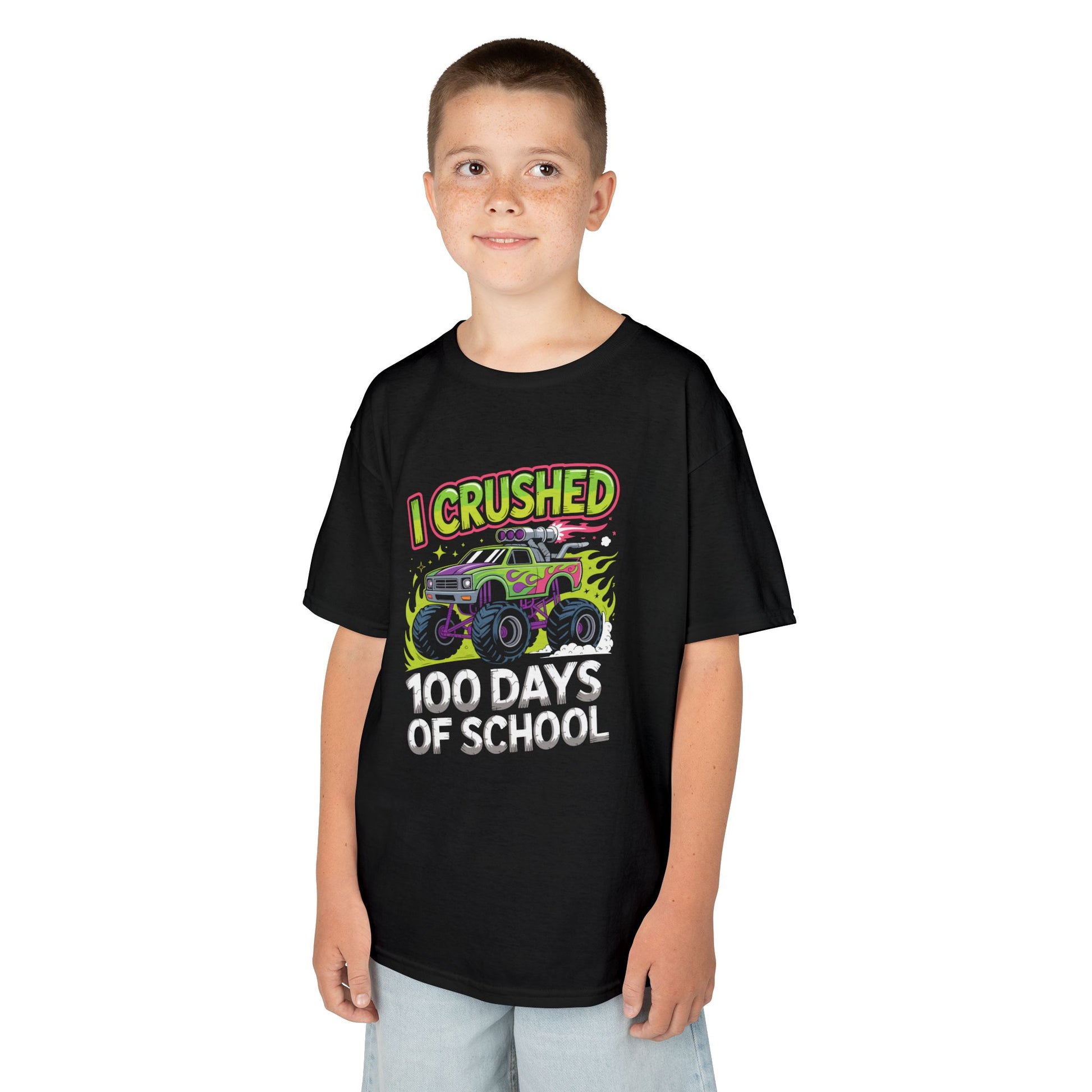 Boy wearing a black TEEZOCA “I Crushed 100 Days Of School” 100th day monster truck shirt.