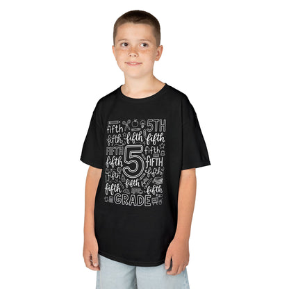 Boy wearing a black TEEZOCA fifth grade typography kids t-shirt, a cute back to school shirt for a new fifth grader.
