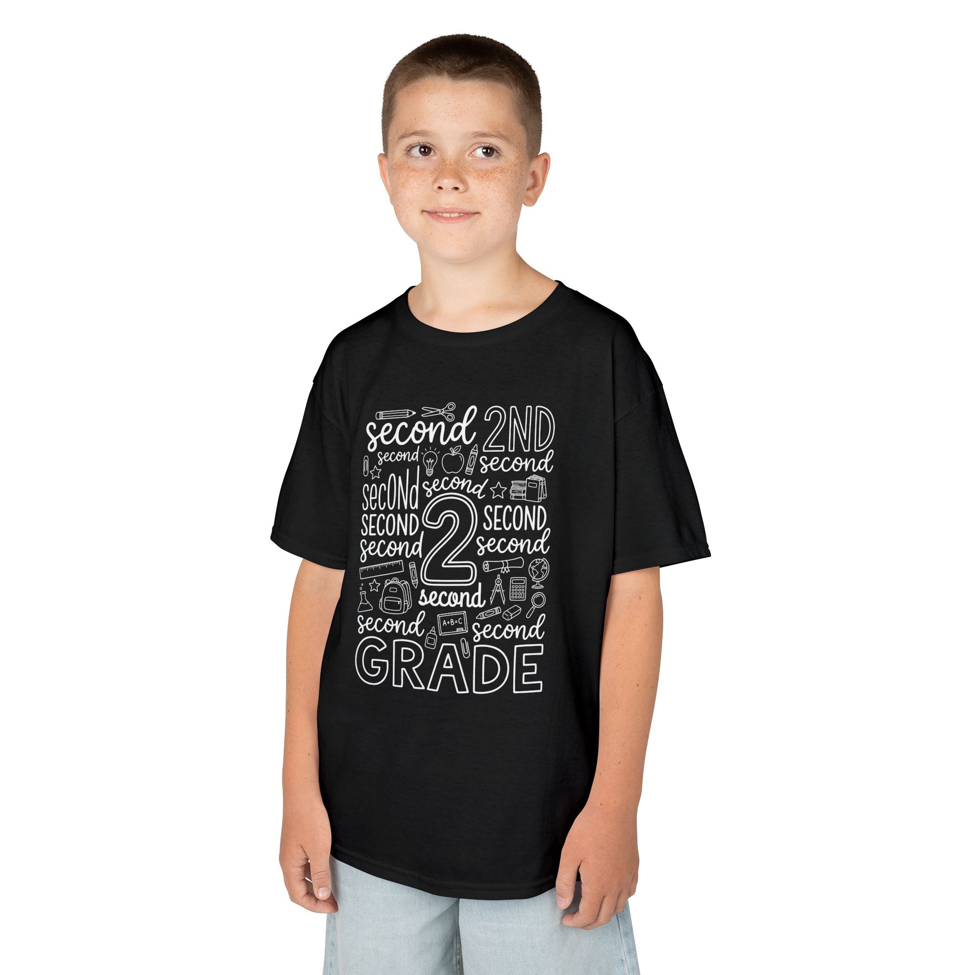 Boy wearing a black TEEZOCA second grade typography kids t-shirt, a cute back to school shirt for a new second grader.
