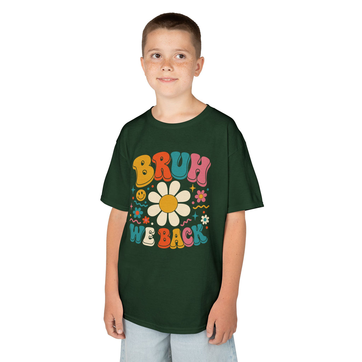 Boy wearing a forest green TEEZOCA Bruh We Back retro kids t-shirt, a funny back to school shirt.
