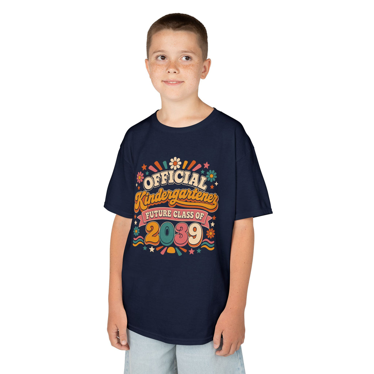 Boy wearing a navy TEEZOCA Future Class of 2039 retro kids t-shirt, a cute back to school keepsake shirt for a new kindergartener.
