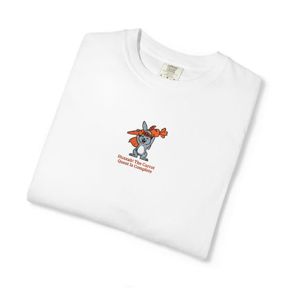 Close-up of a Comfort Colors® WHITE shirt featuring a rabbit holding carrots with the saying “Huzzah! The Carrot Quest Is Complete.”

