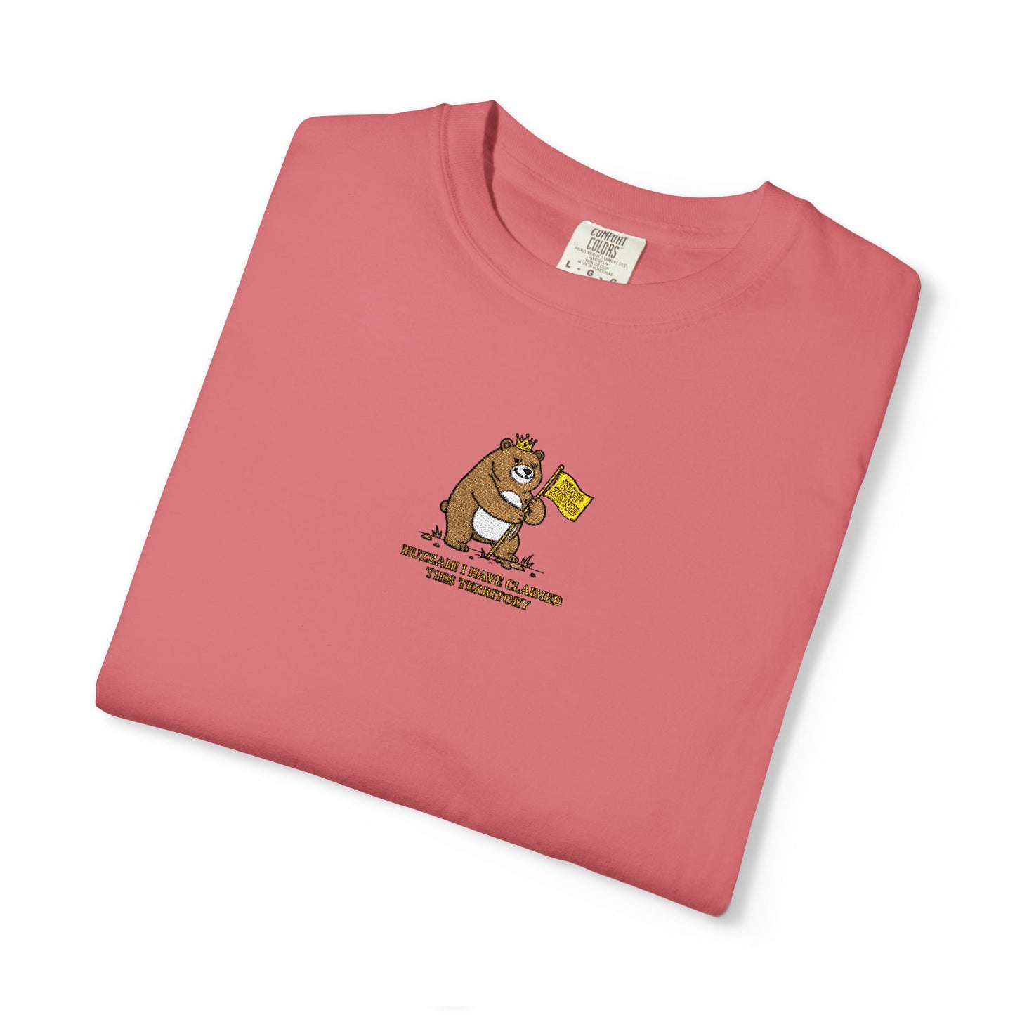 Close-up of a Comfort Colors® Watermelon shirt featuring an embroidered grumpy bear holding a "Do Not Enter" flag with the saying "Huzzah! I Have Claimed This Territory.

