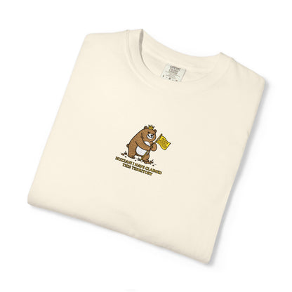 Close-up of a Comfort Colors® cream shirt featuring an embroidered grumpy bear holding a "Do Not Enter" flag with the saying "Huzzah! I Have Claimed This Territory.

